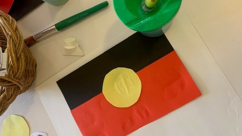 Painting of Aboriginal flag done at QEC.